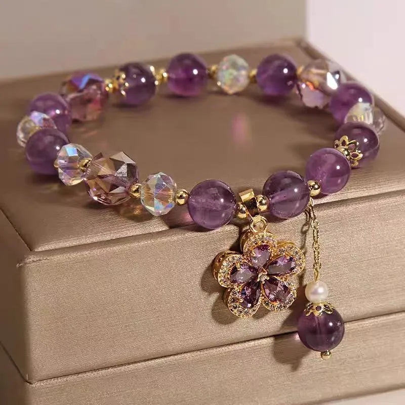 Natural amethyst fox pendant bracelet with five-leaf flower and nine-tailed fox charm, antique style, on a neutral background