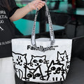 A colour-printed waterproof PP woven handbag in a portable size for clothing and cosmetics.