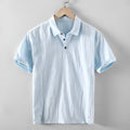 Men's loose-fit linen casual shirt in a solid colour on a hanger