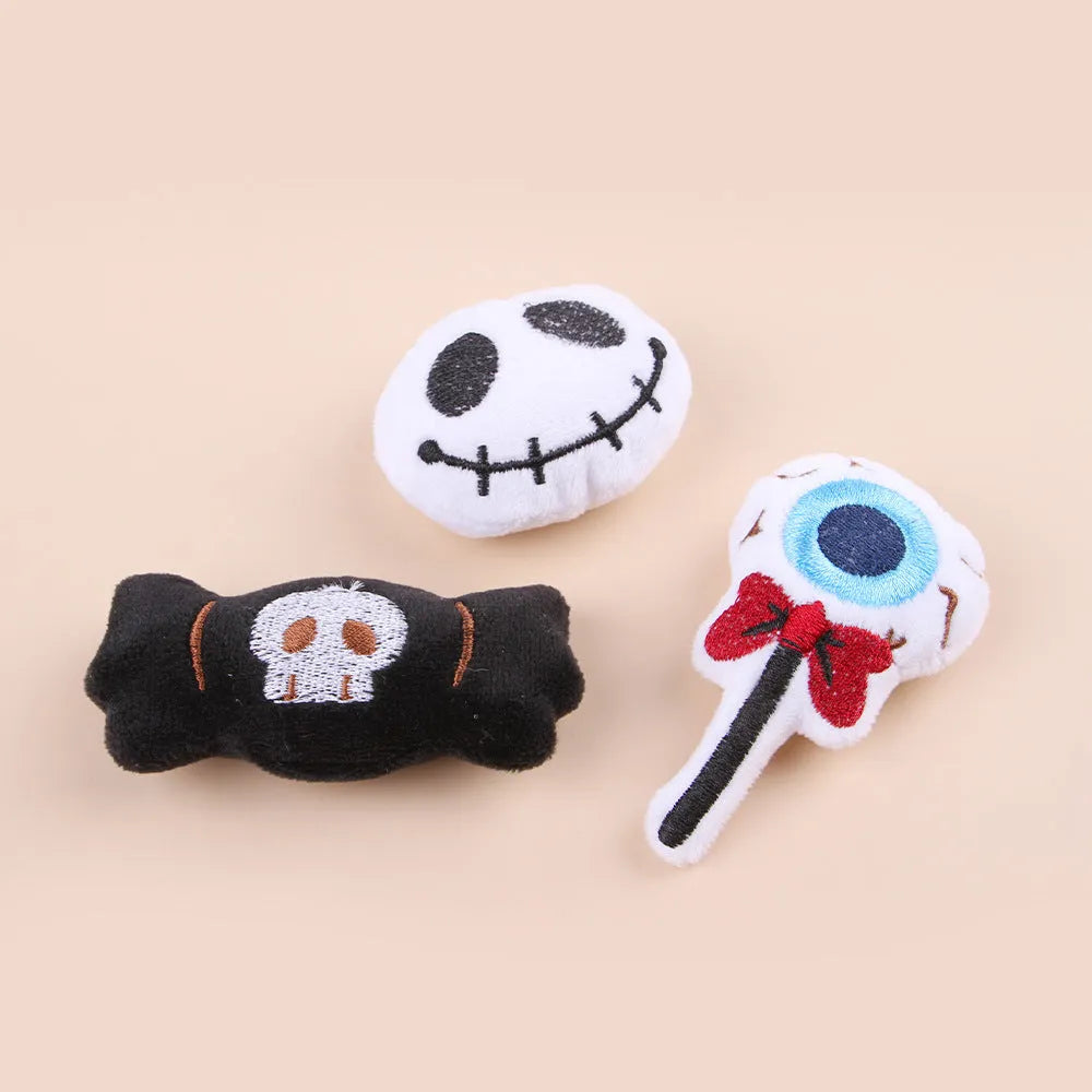 Small plush cat teaser toy with wand and colourful attachments for feline play