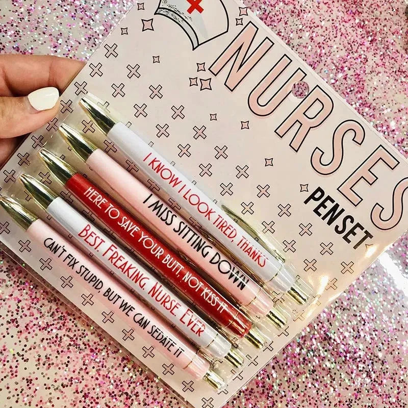 Set of five blue and pink nurse-themed retractable ballpoint pens on a white background.
