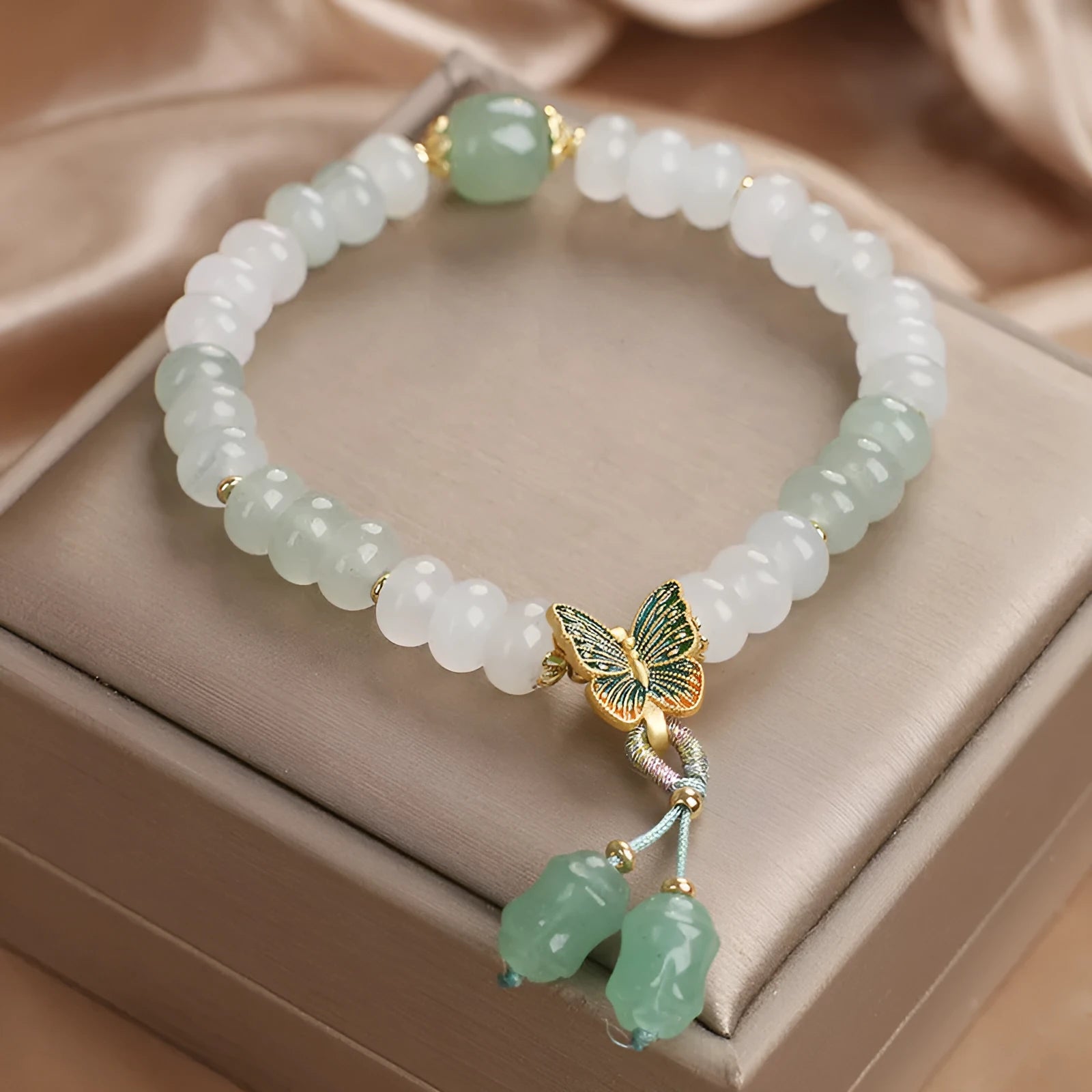 Green crystal Tian Shan Cui abacus beads jade bracelet with retro butterfly tassel and pearl decoration