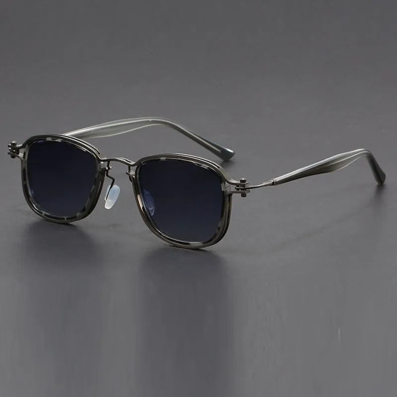 Retro style square frame sunglasses with metal arm details and tinted lenses in a two-tone colour finish.