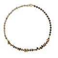 Natural tigereye bronze geometric bracelet with simple unisex style on neutral background