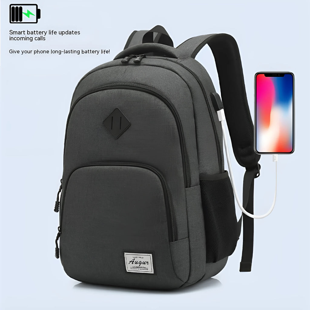 Gray USB charging backpack with luggage strap on a trolley case, showing charging port.