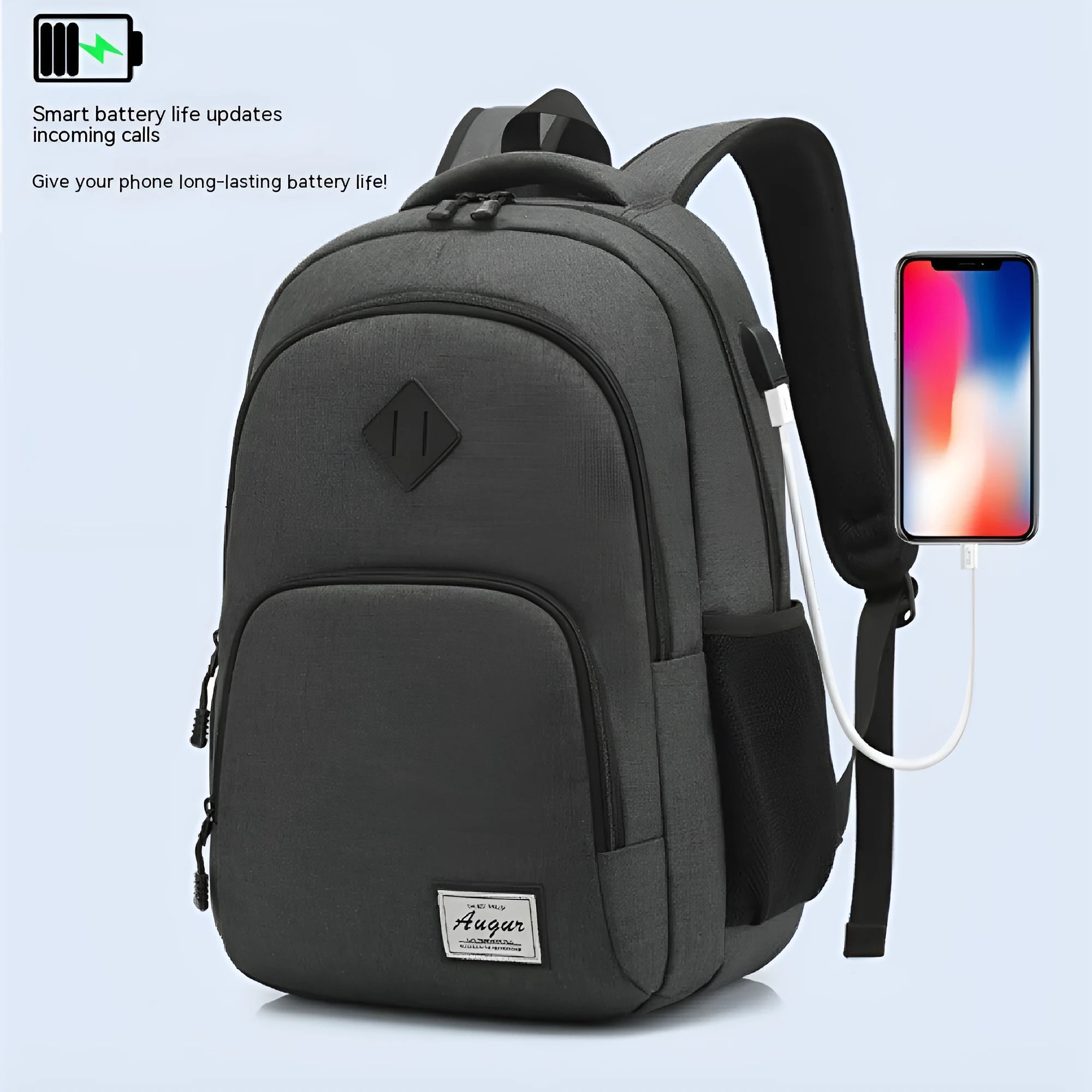 Gray USB charging backpack with luggage strap on a trolley case, showing charging port.