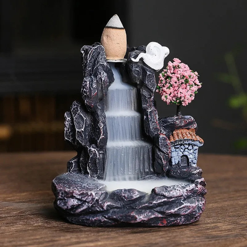 Creative ceramic backflow incense burner ornament in modern simplicity style with smoke cascading downwards
