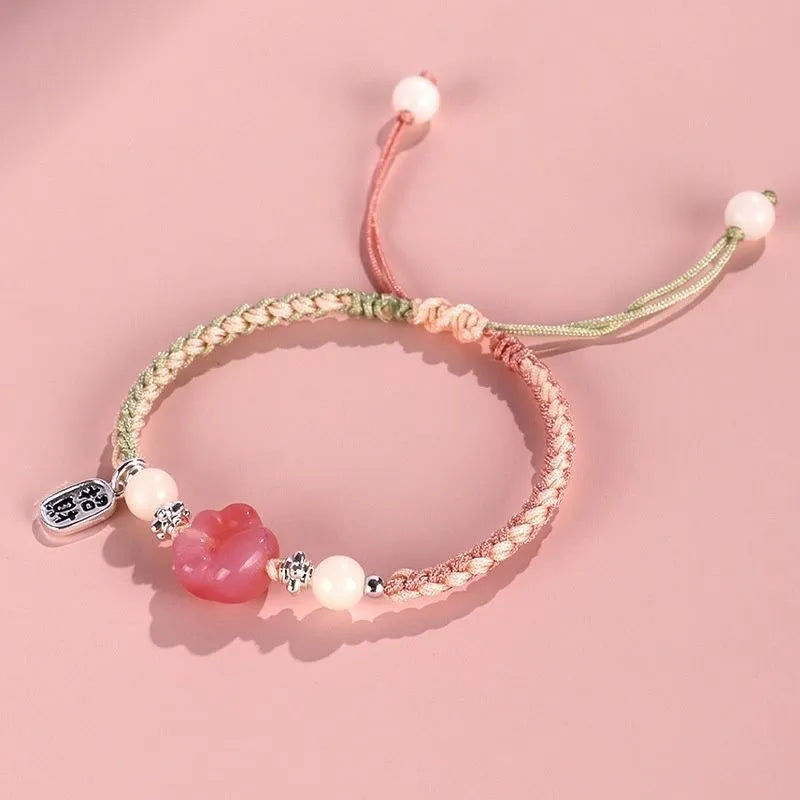 Handmade glass and coloured glaze cat's paw woven bracelet for couples in red, pink, or yellow
