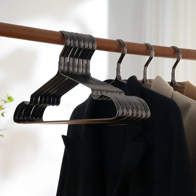 Modern black non-slip clothes hanger for anti-rust wardrobe organisation.