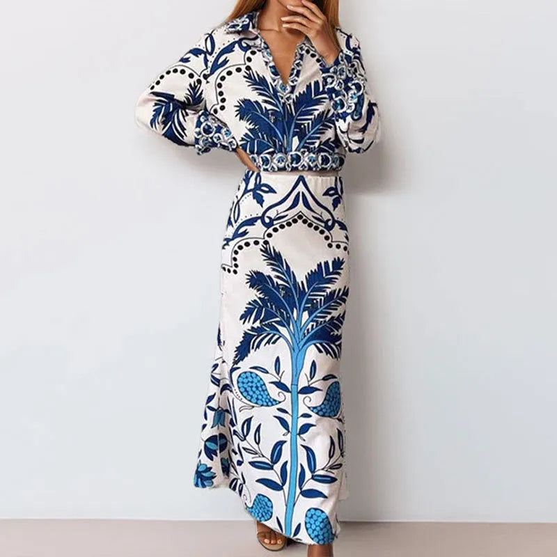 Women's floral print polyester co-ord set with long sleeves and a long skirt on a hanger.