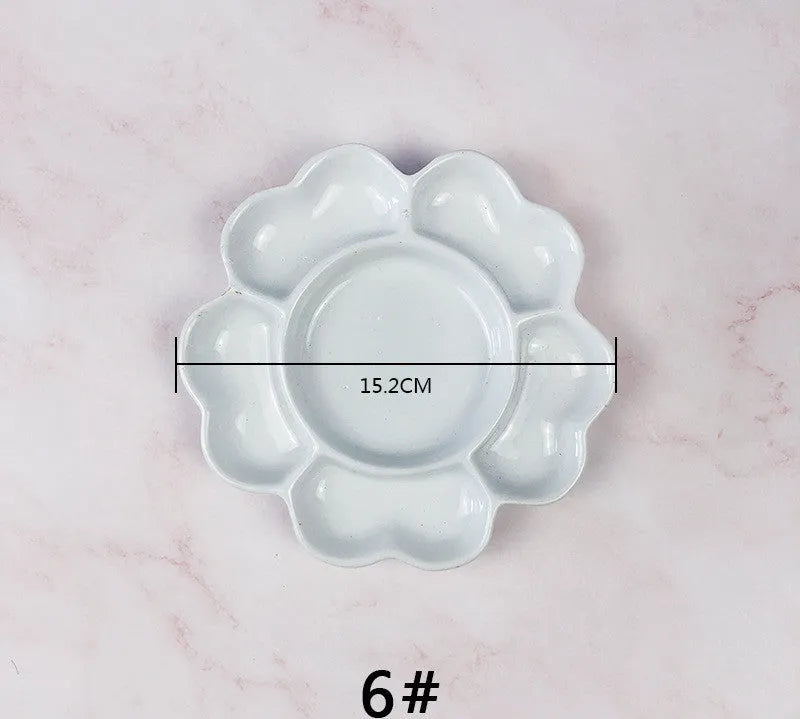 White ceramic plum blossom shaped painting palette for watercolour, acrylic and oil paints