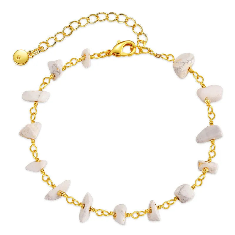 Geometric women's bracelet with irregular natural gravel turquoise stones and crystal elements on 18K copper