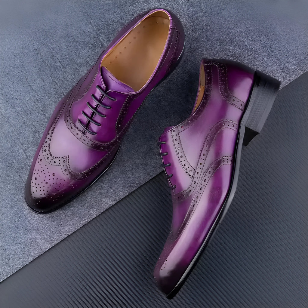 Men's hand carved cowhide Oxford shoes in black with pointed toe and low top design