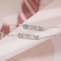 Stainless steel digital bracelet with diamond-studded numbers on display.