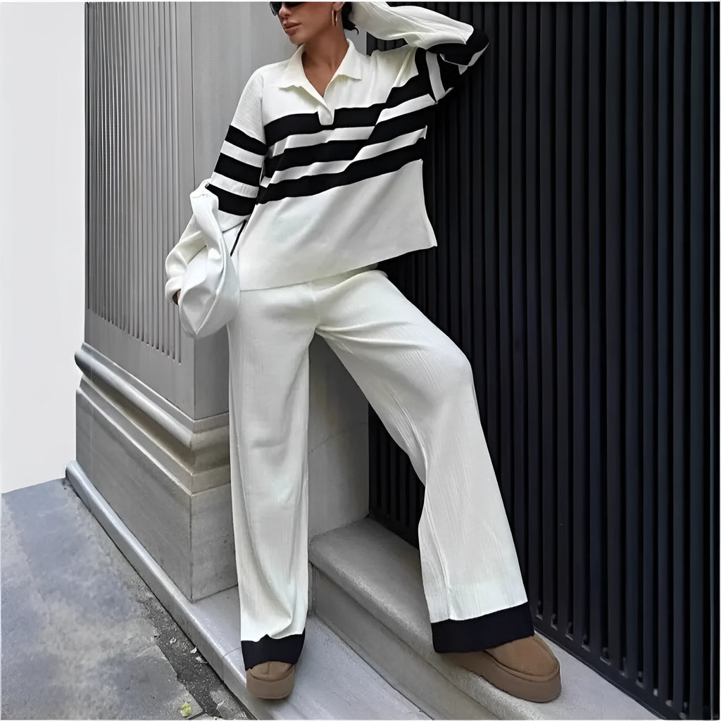 Women's black and white striped two-piece set with polo collar shirt and trousers