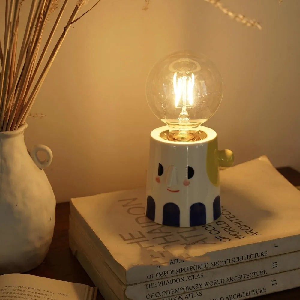 Handmade ceramic lamp with ball headlight design for bedside and decorative lighting