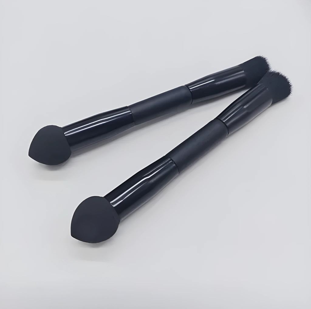 Double-headed black makeup brush with angled sponge and concealer brush on wooden handle