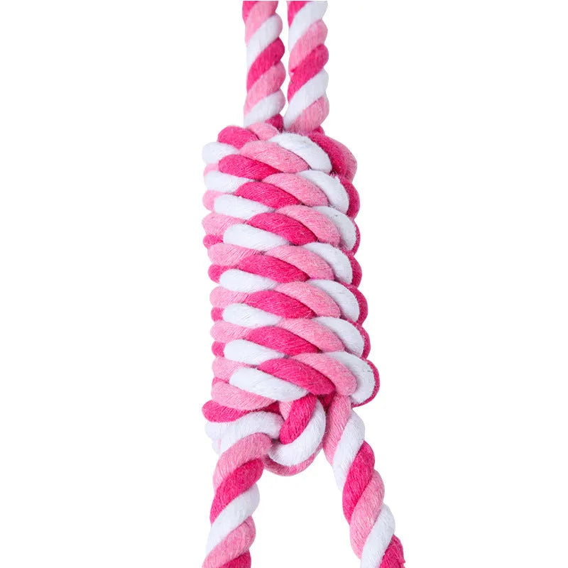 Red and white cotton rope dog toy approximately 38cm long for medium and large breeds