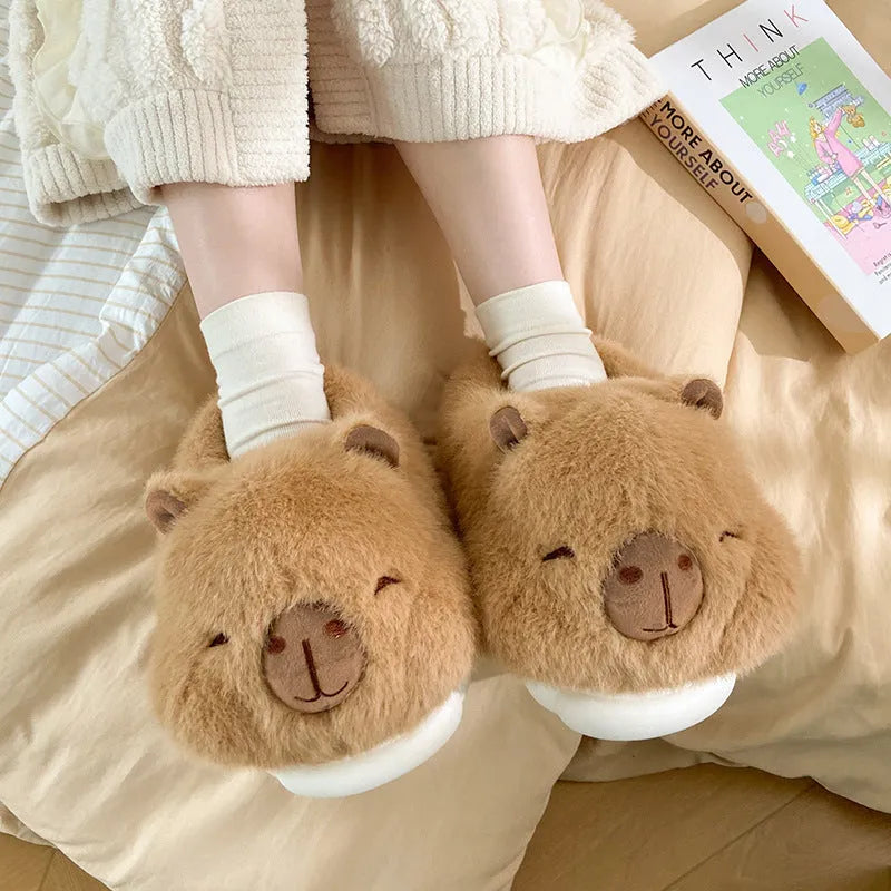 Light brown women's winter slippers with cartoon pattern, plush upper and artificial wool lining