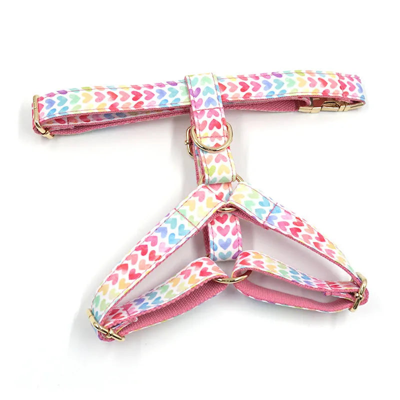 Pink colourful dog chest and back harness with gold buckle and heart-shaped stone on polyester strap