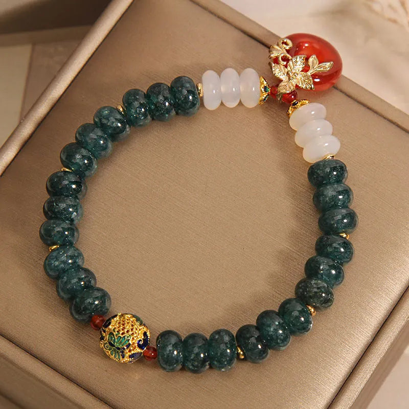 Blue water jade abacus beads crystal bracelet with red agate peace buckle and rhinestone accents for women