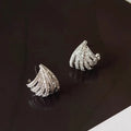 Platinum-coloured geometric line design earrings with zircon construction