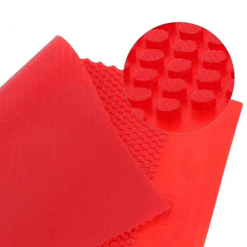 Black and red table tennis rubber sheet with small particle surface texture
