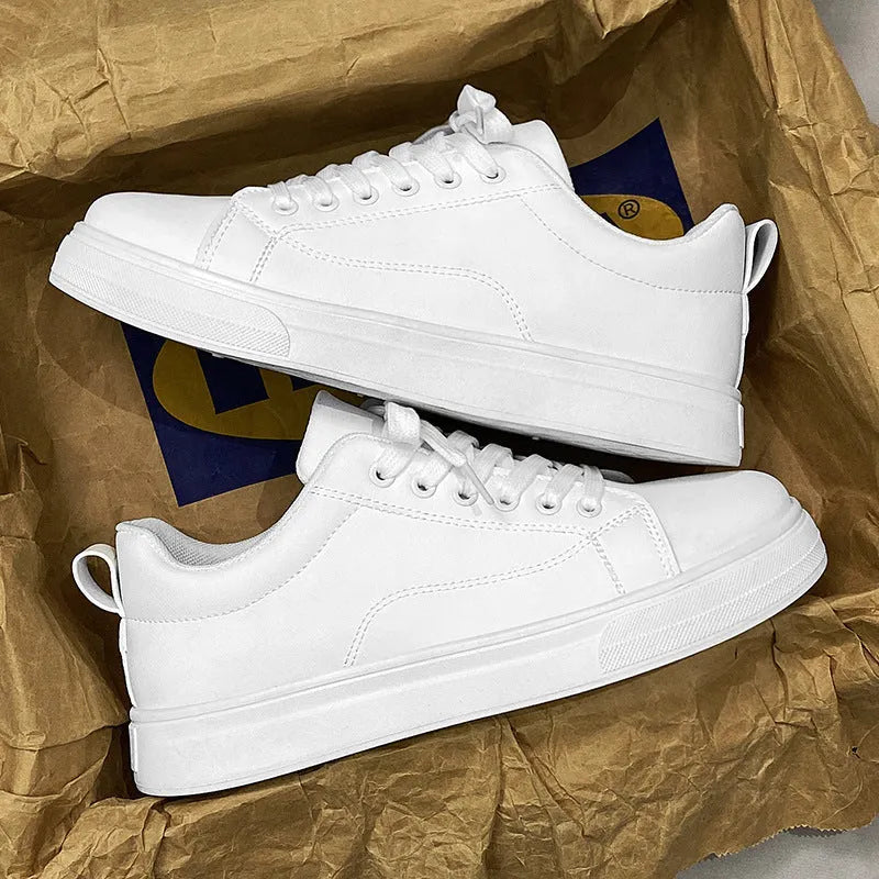 Men's low-top white and black Korean-style casual sneakers with a round toe and rubber sole.