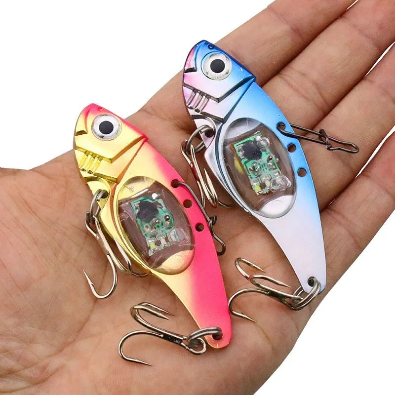 Luminous metal vib electronic fishing lure in blue and red body colours for casting and trolling