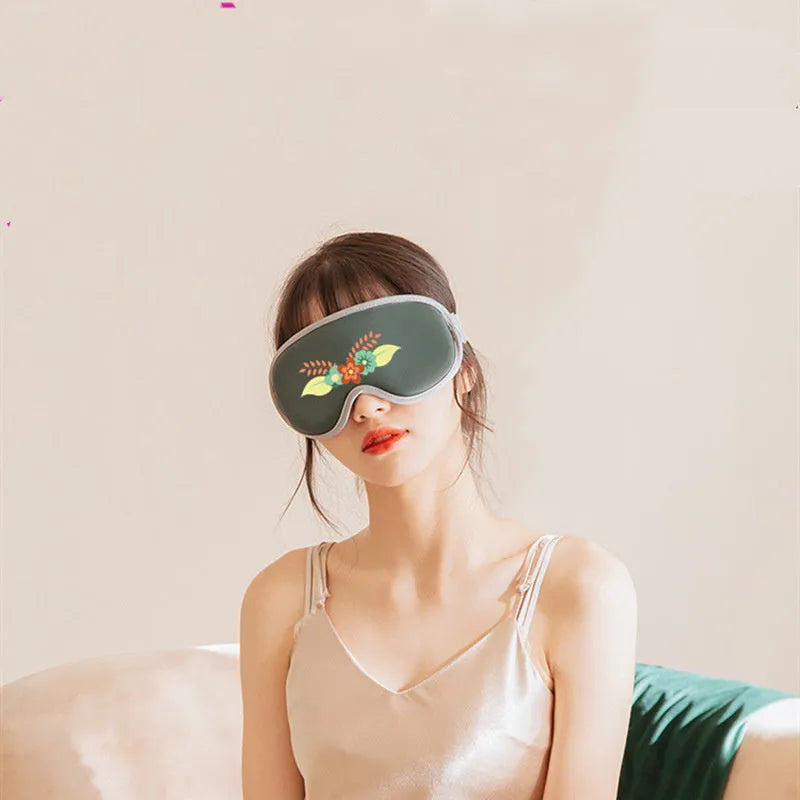 Green portable eye SPA mask with suede exterior on a white background.