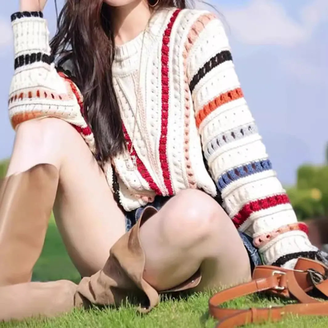 Rainbow striped batwing sleeve sweater with loose fit and round neck design