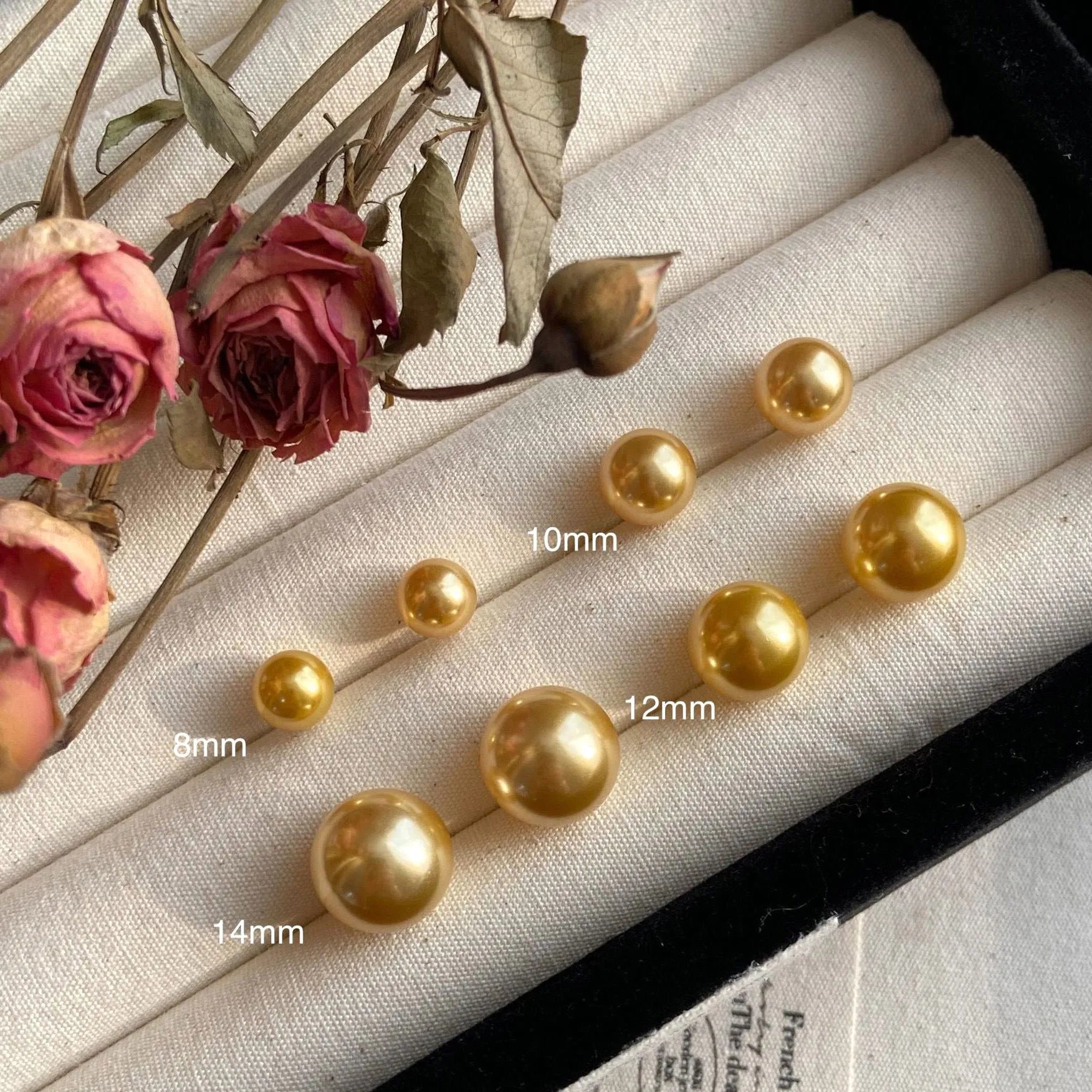 Large geometric pearl stud earrings with retro styling and eight-point star detail in silver