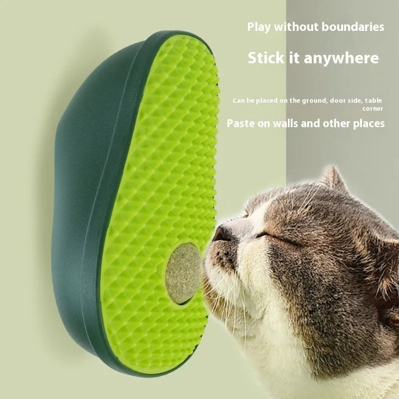 Avocado cat toy with green and brown ABS TPR texture, 13.5 cm long, on a flat surface