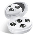 White wireless red light EMS facial and eye massager device on a table