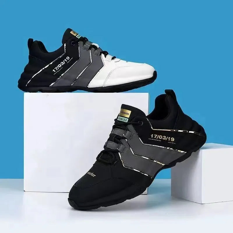 Casual low-top sneakers with round toe, lace-up front, and thick plastic sole in black and grey.