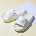 EVA flip-flop slippers with thick non-slip sole in various colours on a white background.