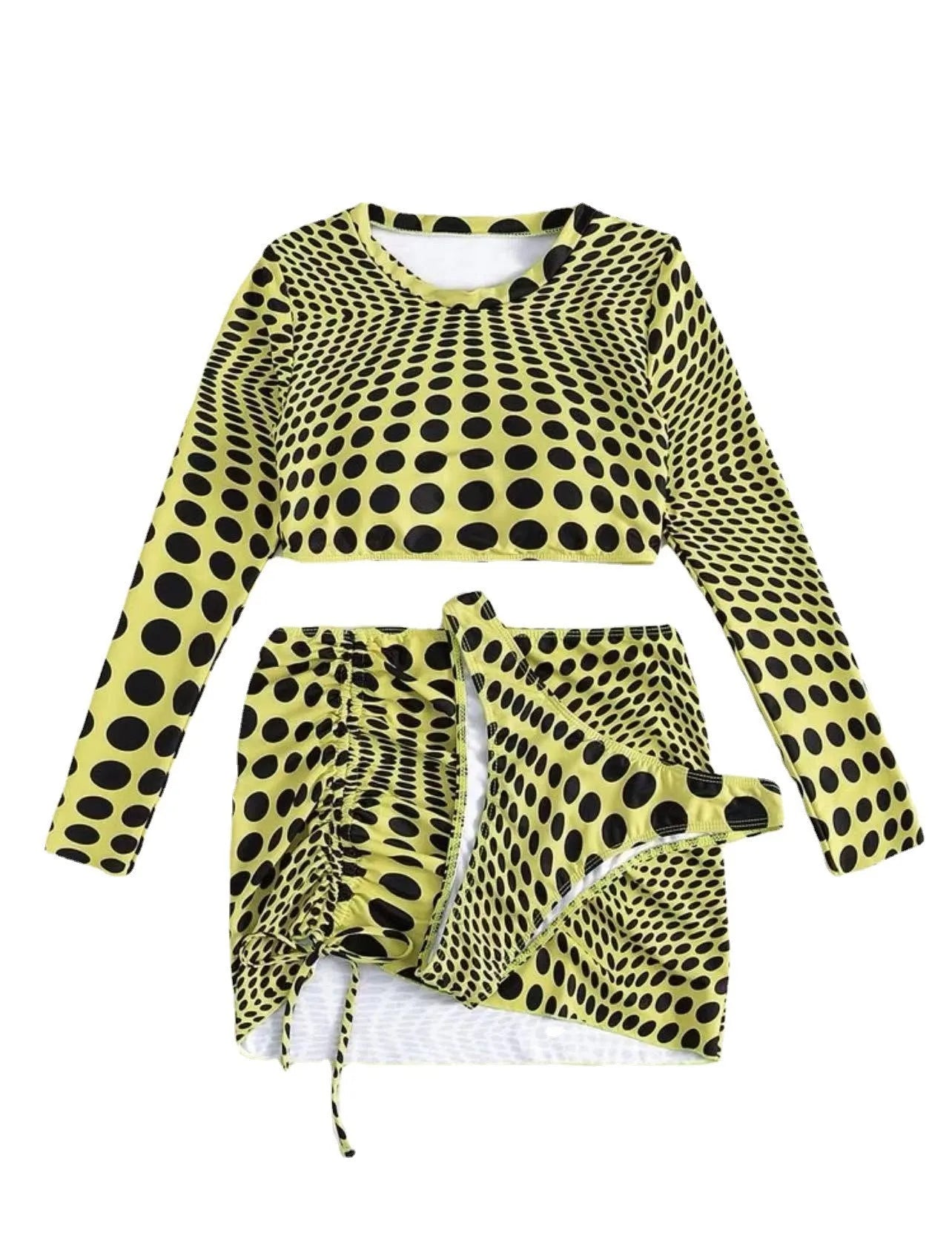 Women's green polka dot three-piece swimsuit set with top, skirt, and bra