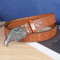 Men's brown imitation leather belt with alloy cow head buckle showing pin fastening