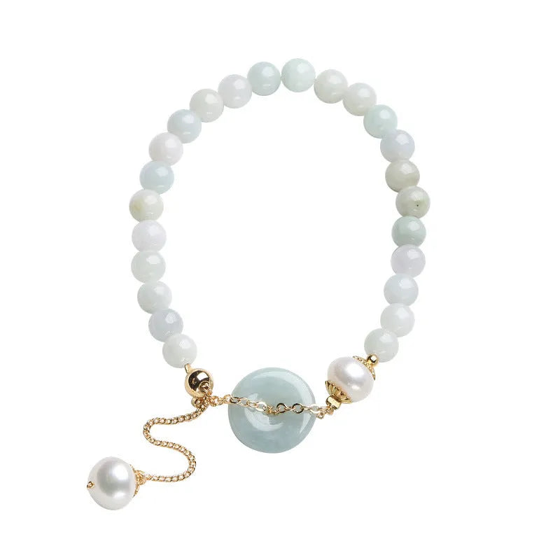 Women's jade bracelet with emerald peace buckle and pearl details in geometric national style design