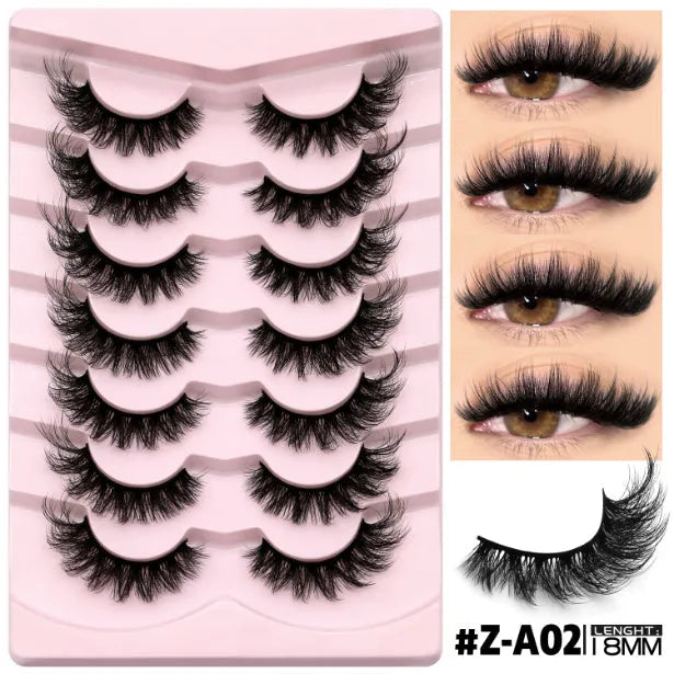 Box of artificial fibre false eyelashes in natural long thick style with glue