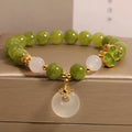 Natural stone green tourmaline four-leaf clover safety buckle bracelet for women, drop-shaped geometric new Chinese style, green colour