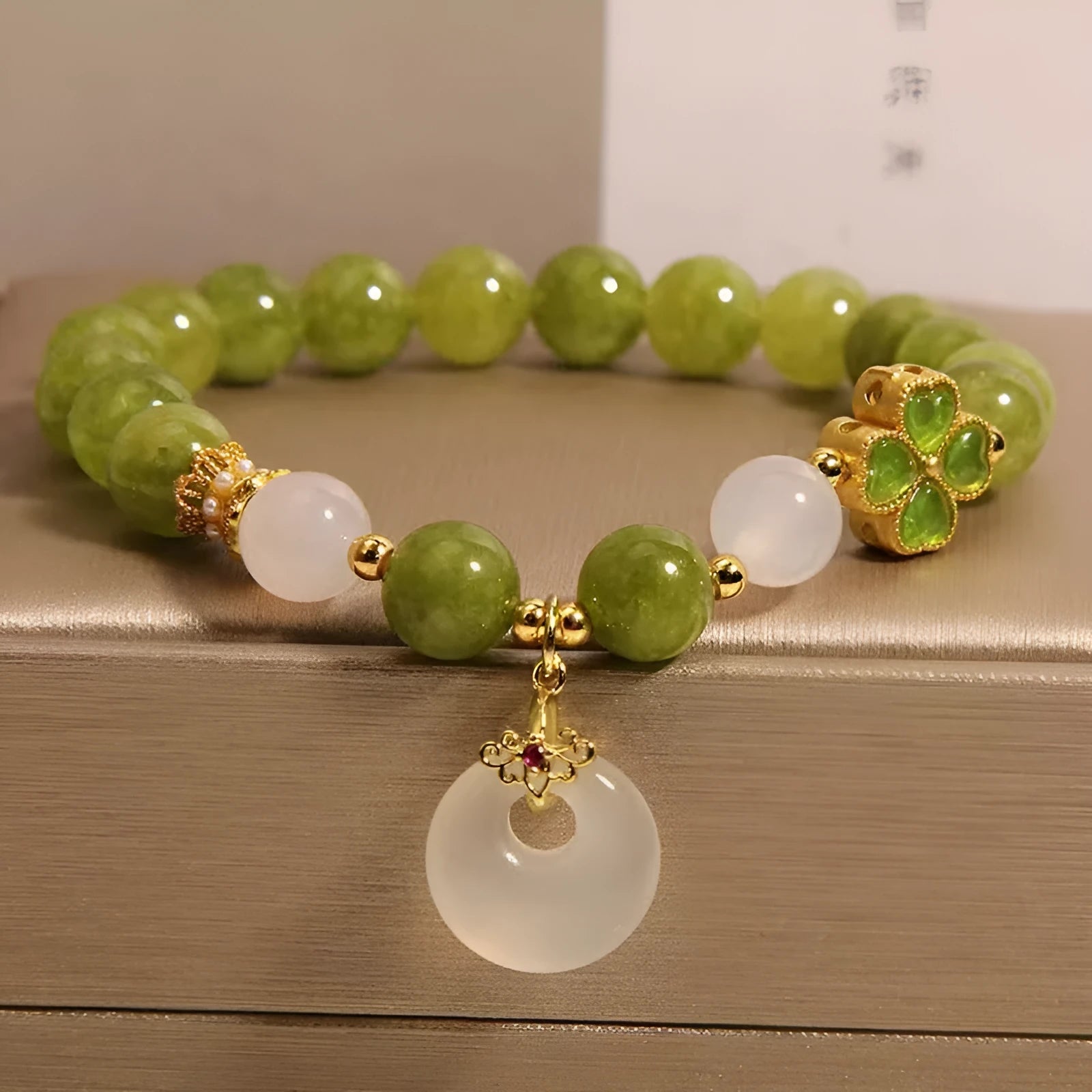 Natural stone green tourmaline four-leaf clover safety buckle bracelet for women, drop-shaped geometric new Chinese style, green colour