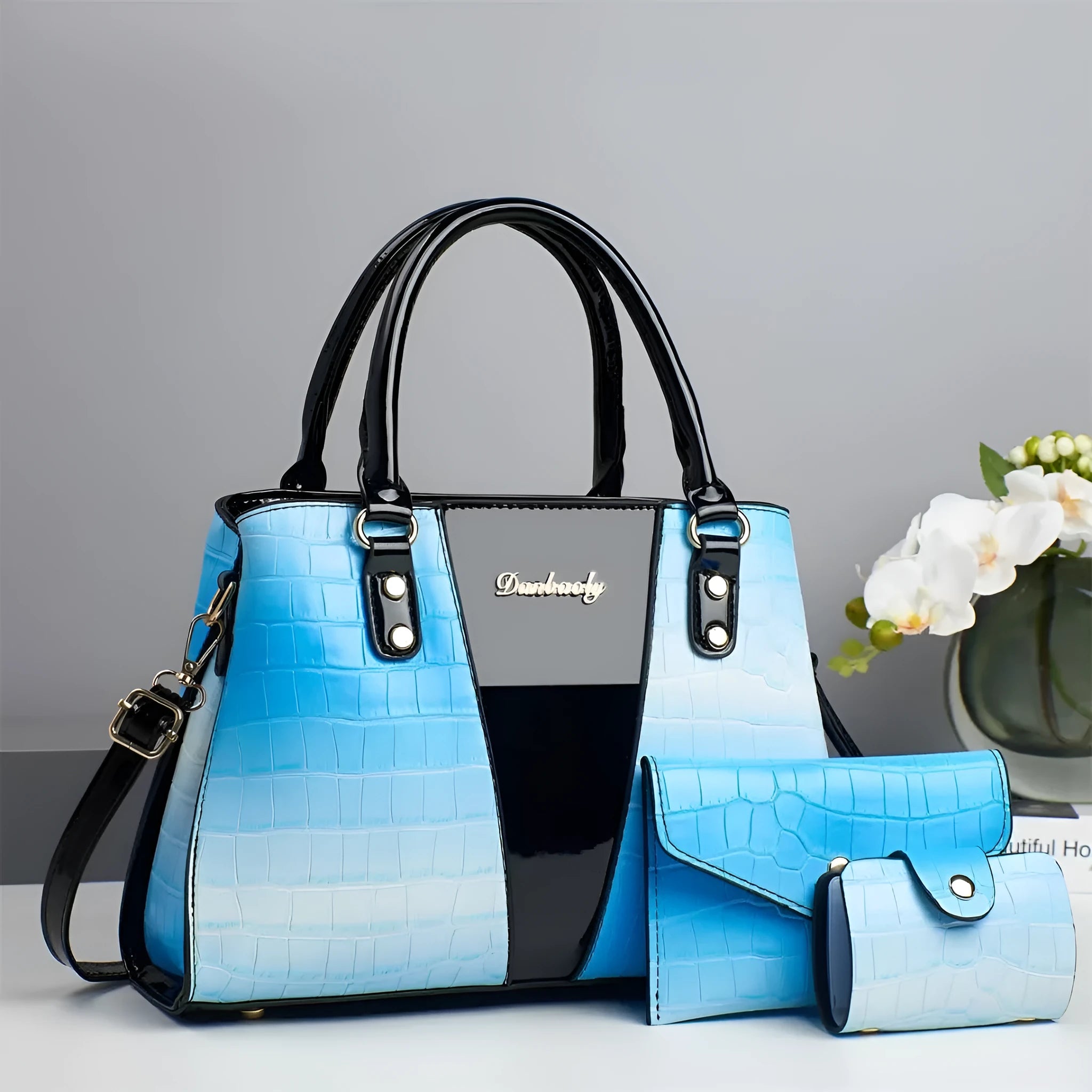 Women's crocodile-stitch three-piece shoulder bag set in PU leather showing main bag, small bag, and card holder