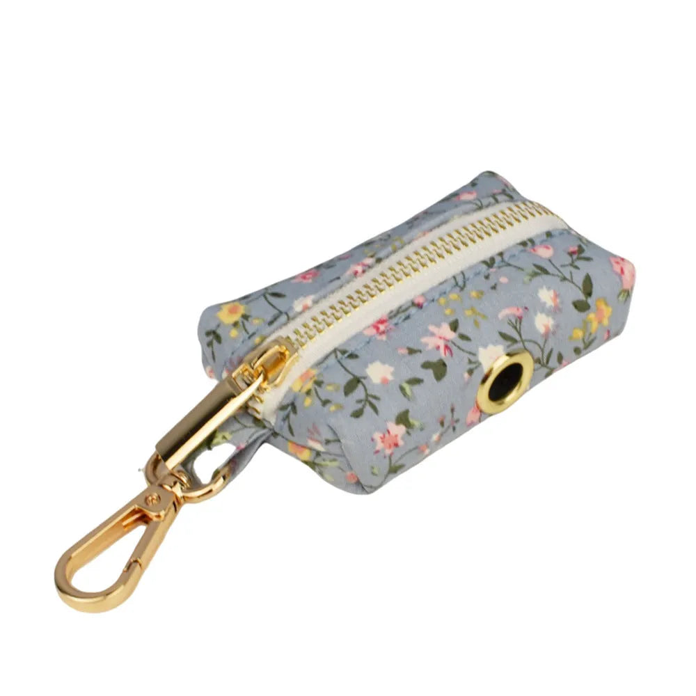 Blue floral polyester cotton dog collar and matching accessory set including leash, vest, bow tie, and waste bag