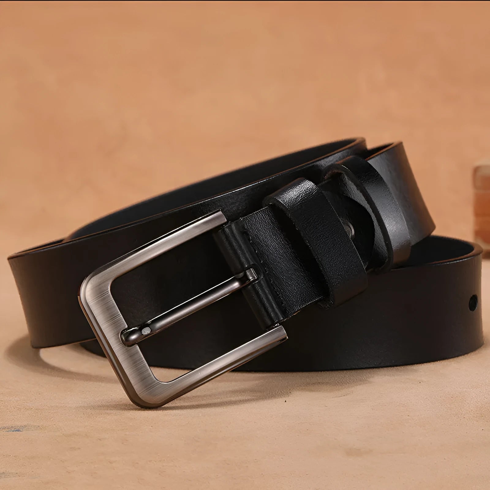 Square-head pin buckle casual belt in black or brown colour with adjustable strap.
