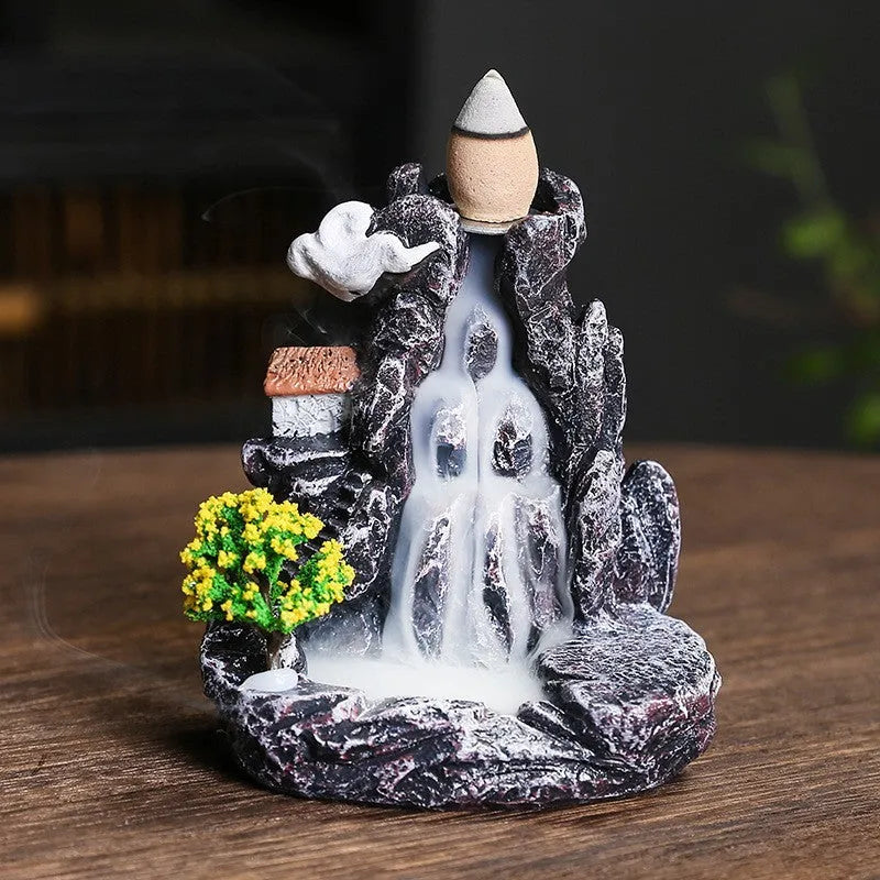 Creative ceramic backflow incense burner ornament in modern simplicity style with smoke cascading downwards