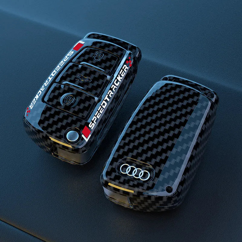 Carbon fibre style car key cover with mirror finish in carbon and white colour options