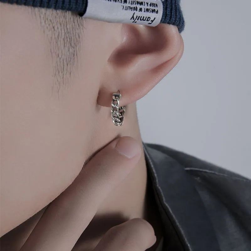 Simple geometric men's silver-tone earrings on a plain background showing front and side views.