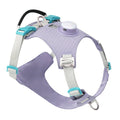 Light purple dog harness with LED light and a handle on the back, shown on a medium-sized dog