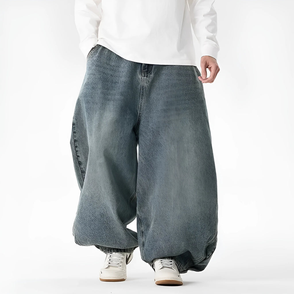 Men's plus size baggy jeans in light blue cotton denim with wide leg straight cut